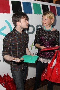 Daniel Radcliffe signs a FitFolio Case for charity at Sundance 2013